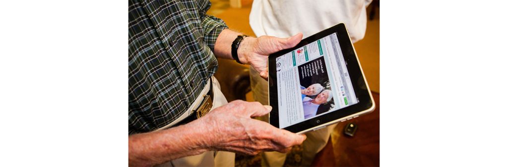 senior resident using an ipad