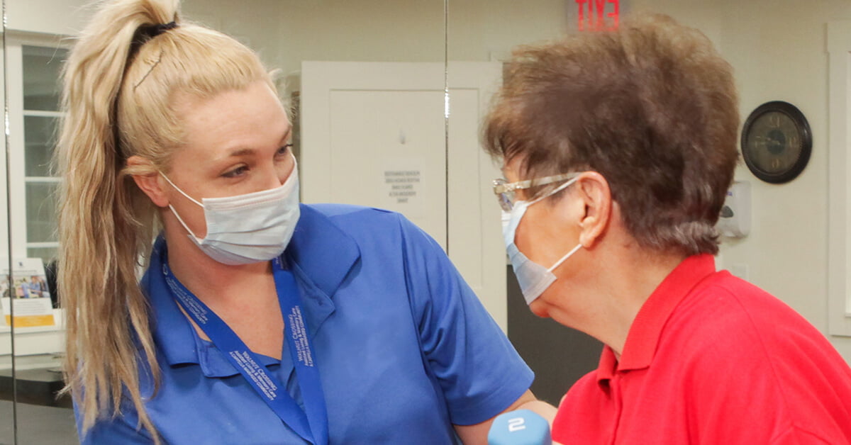 Resident and team member wearing masks